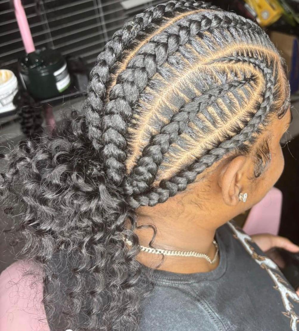Fresh stitch feed-in cornrows with curly loose ends styled at Sophia African Hair Braiding