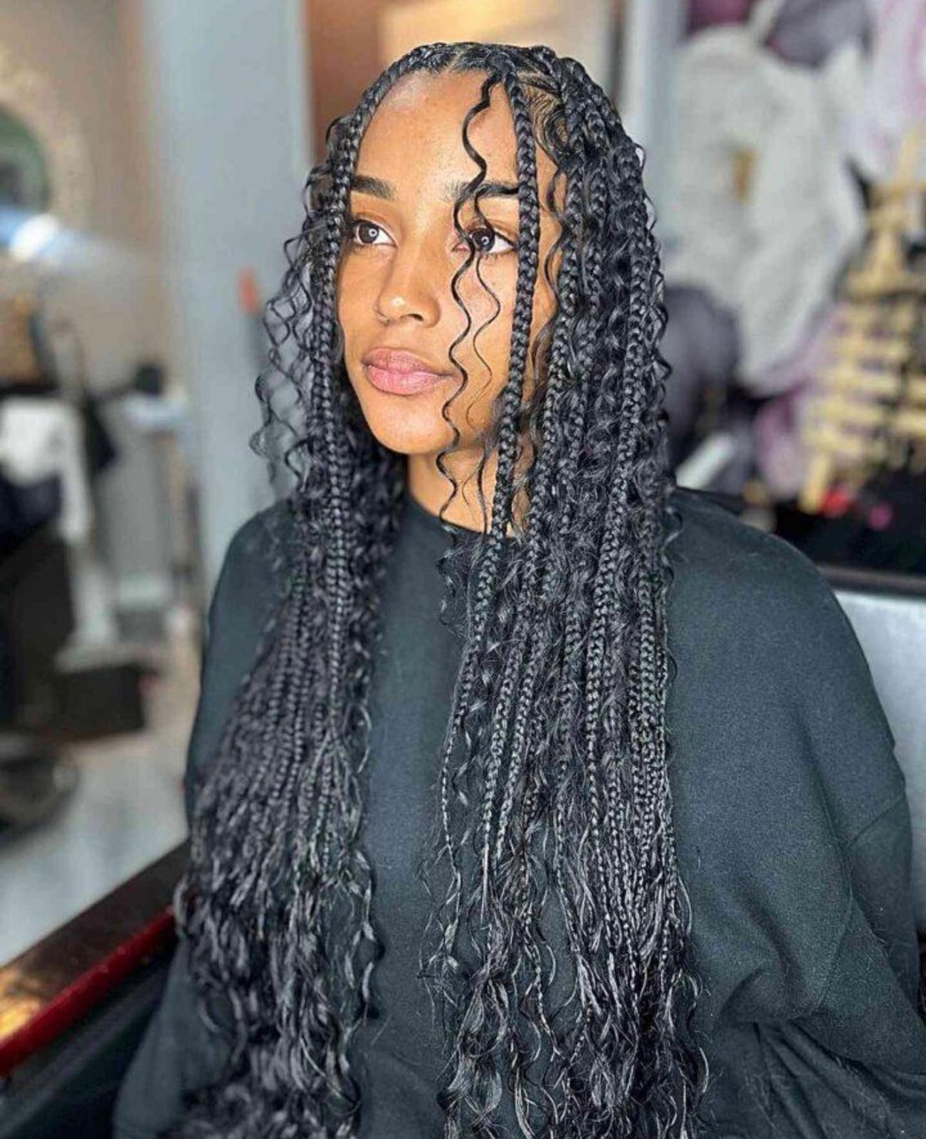 Boho knotless braids with curly ends by Sophia African Hair Braiding, Dayton Ohio